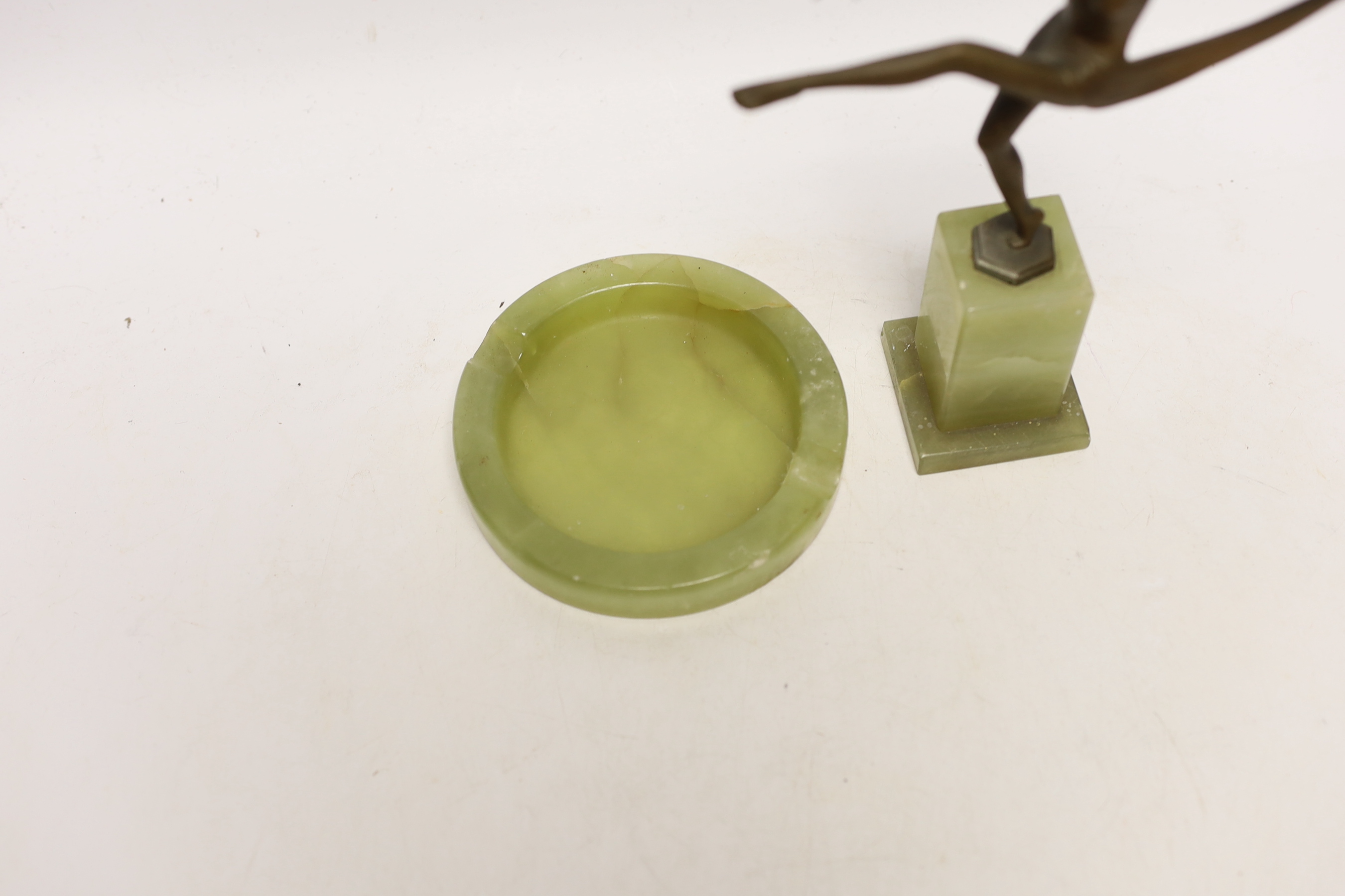 Josef Lorenzl (Austrian 1892-1950), a small Art Deco bronze of a female dancer, marked to base ‘Lorenzl’, raised on a green onyx plinth, together with a green onyx ashtray (2), bronze dancer 21cm high x 14cm wide